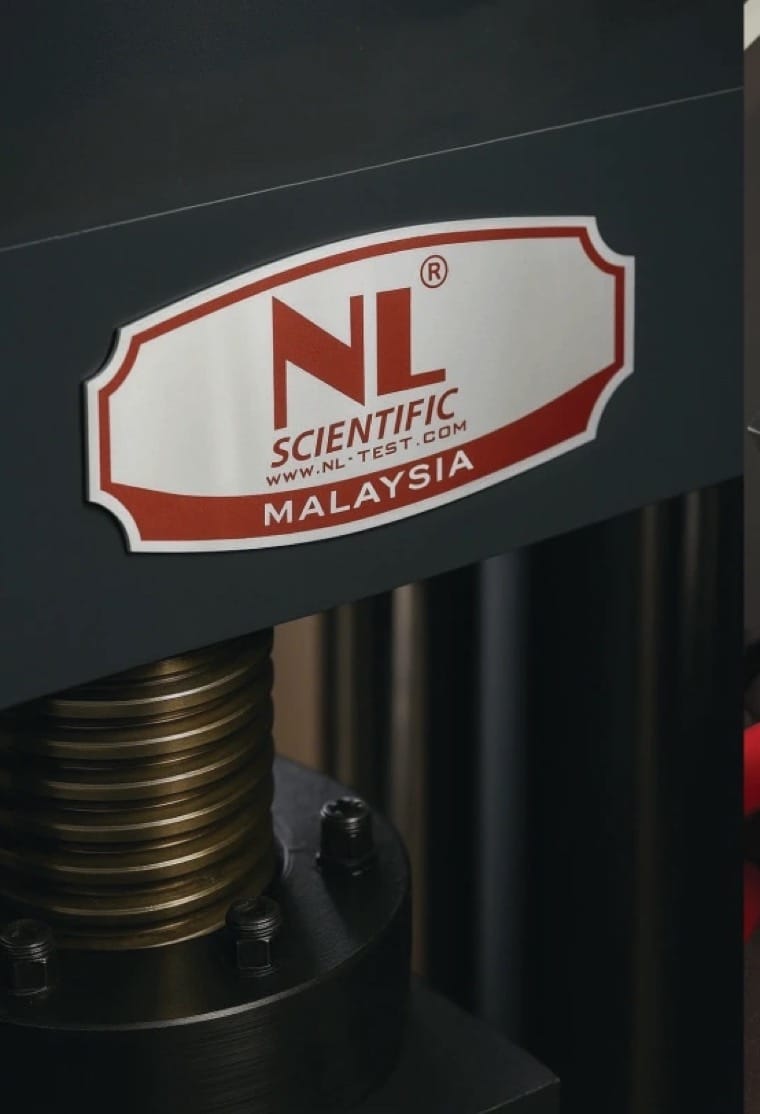 NL Scientific testing machine badge in the lab