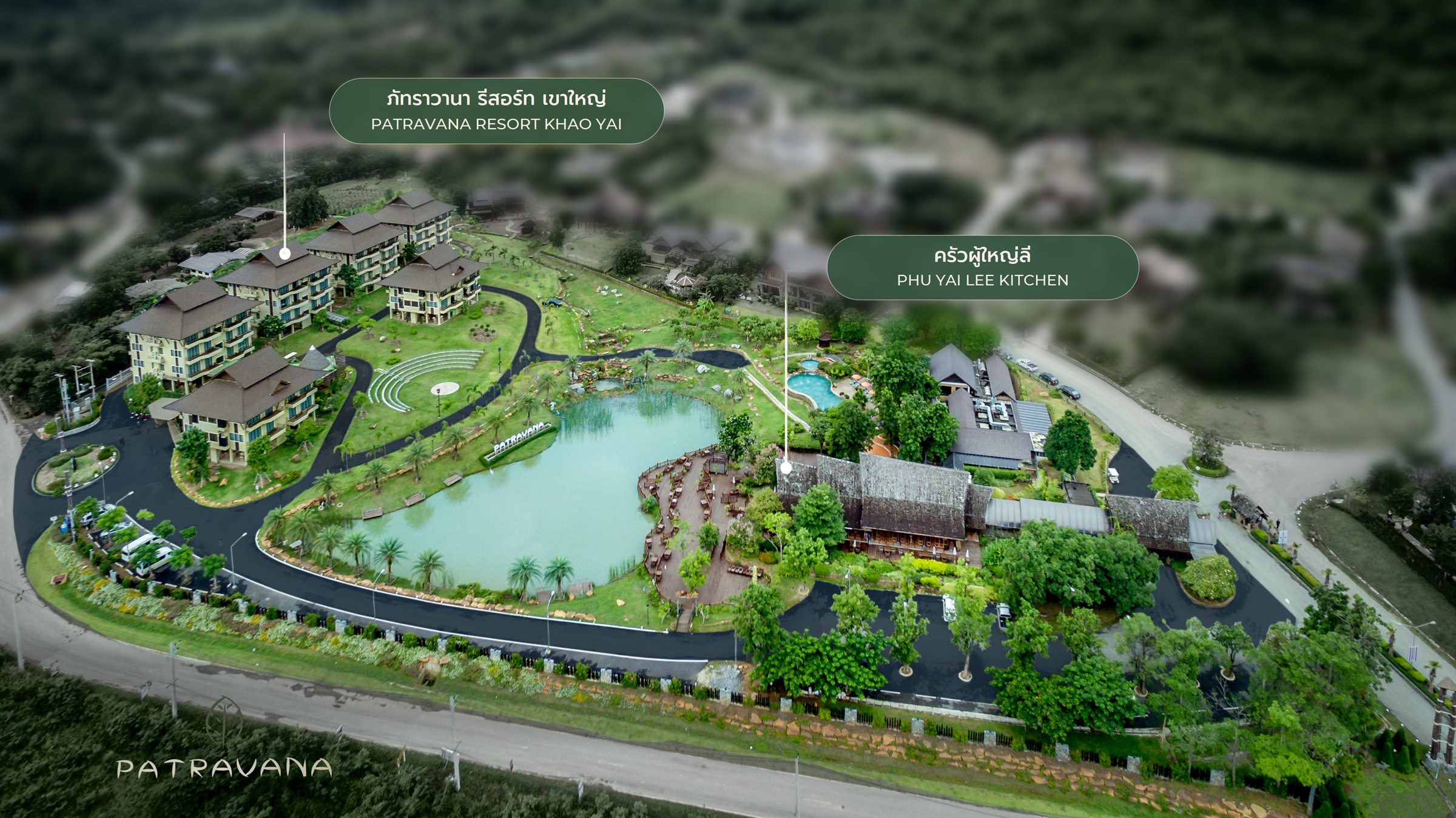Drone view of the whole Patravana estate: the suite wings, amphitheatre, lake, pool and Phu Yai Lee kitchen