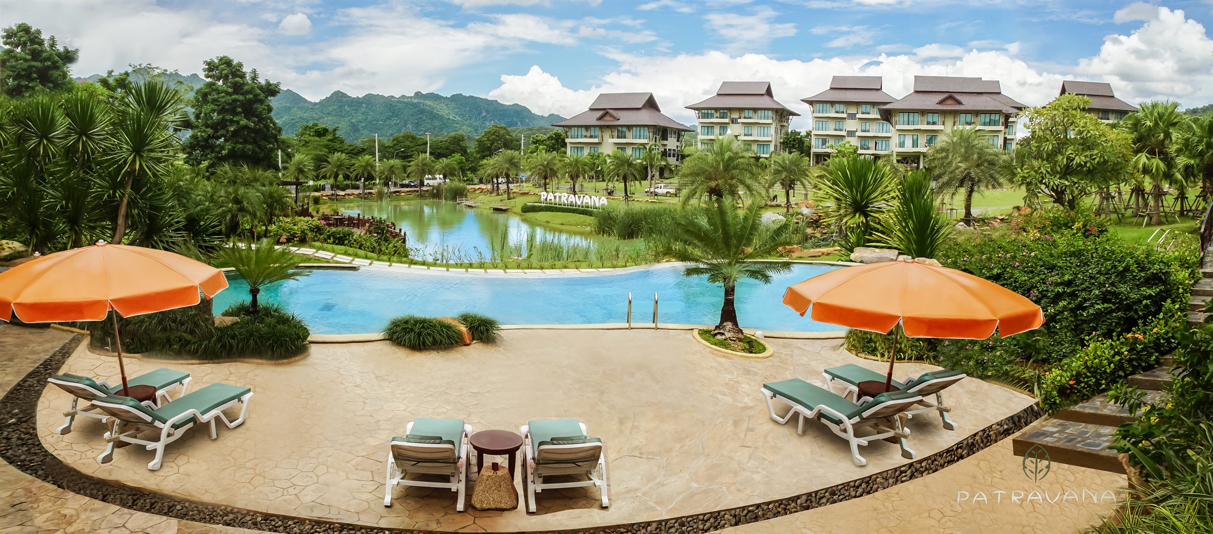 Poolside deck with orange umbrellas